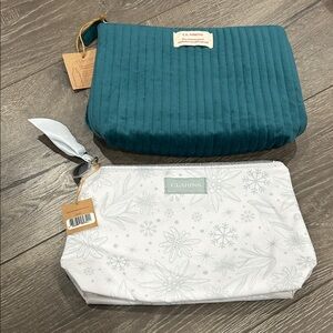 Clarins Teal Quilted and White Floral Bags
